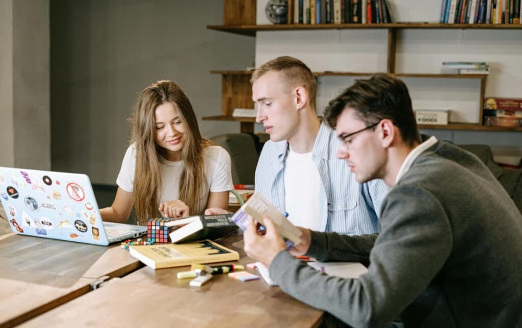 Three people studying